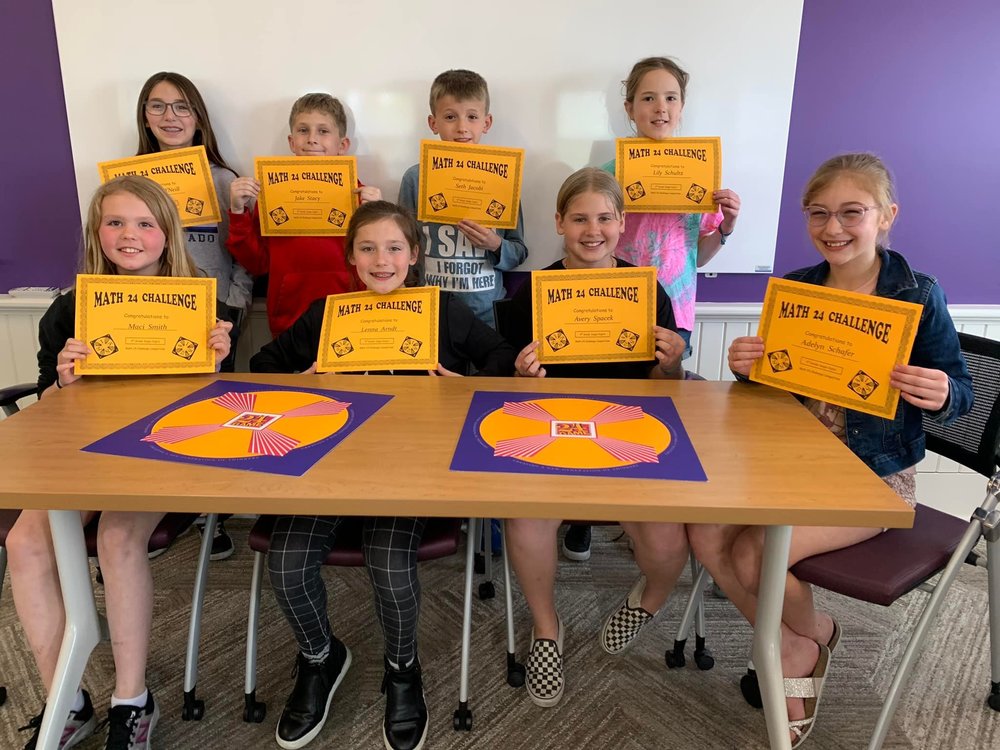 Tibbets students pose with Math 24 certificates