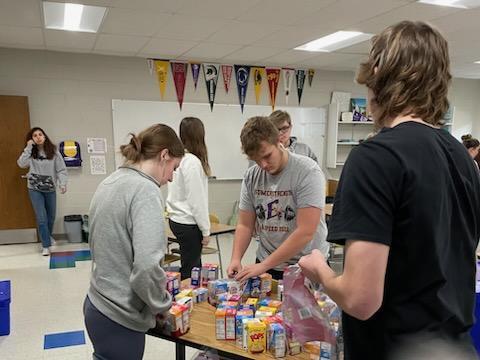 EAHS students packing snacks into bags